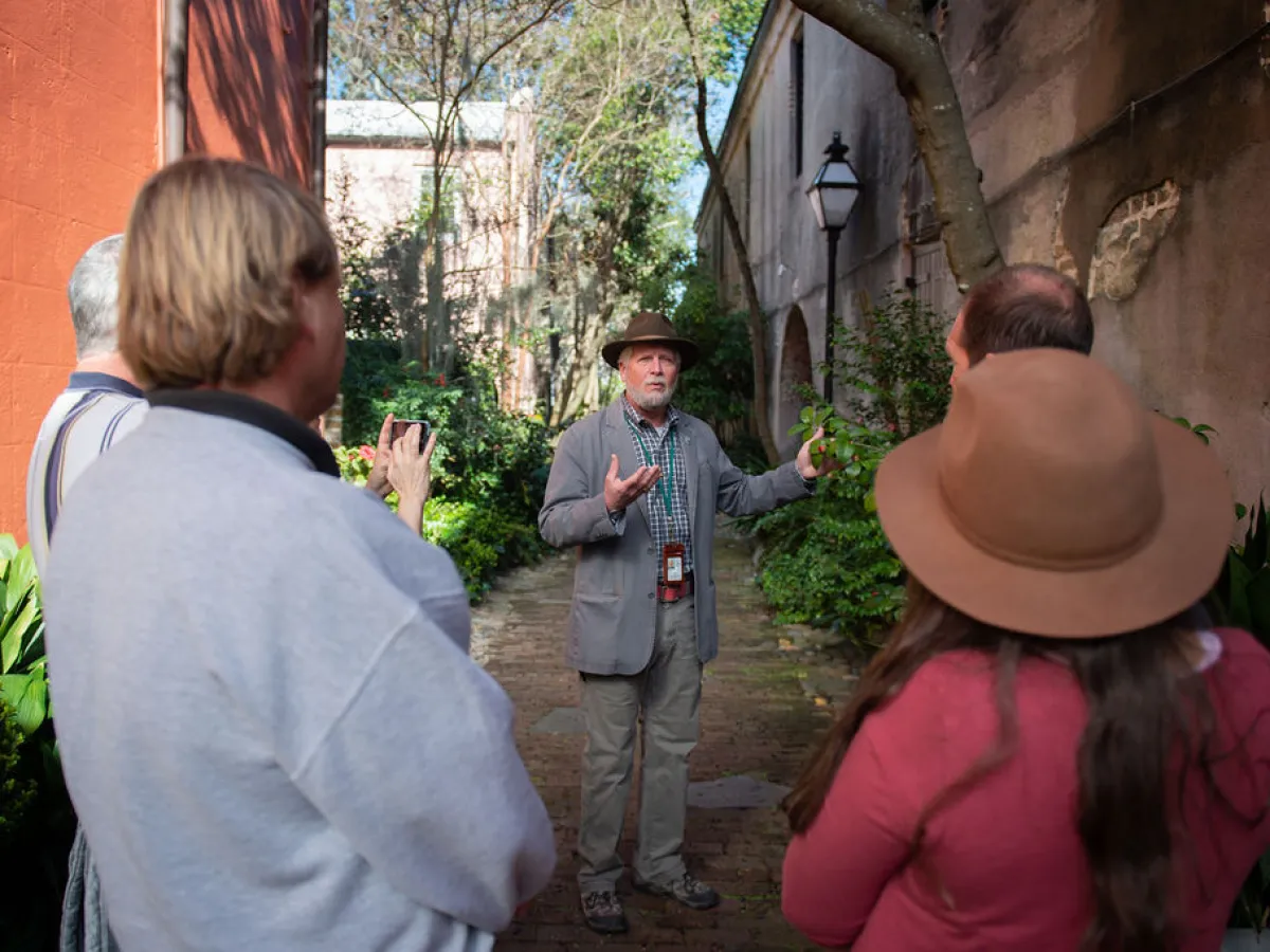 a group of people standing in front of a building